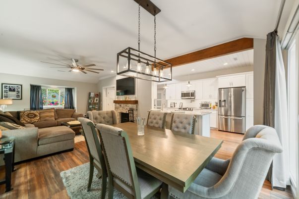 Dining room, Fireplace, Interior, Kitchen, Living room, Pendant Lights, Recessed Lighting, Stainless Steel Appliances, Wood Texture Flooring