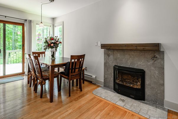 Dining room, Fireplace, Interior, Pendant Lights, Wood Texture Flooring