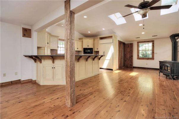 Empty room, Fireplace, Interior, Kitchen, Recessed Lighting, Wood Texture Flooring