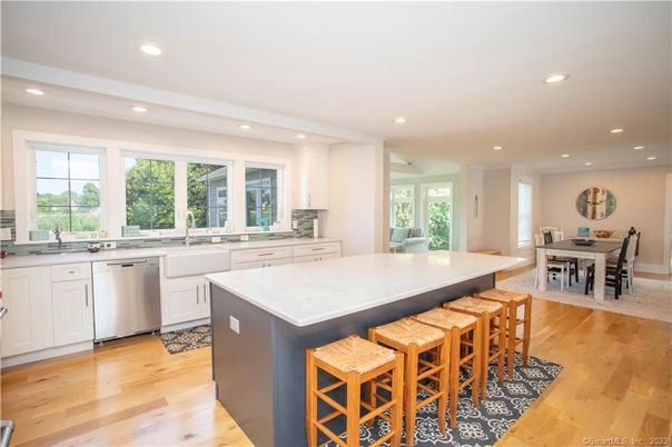 Dining room, Interior, Kitchen, Recessed Lighting, Stainless Steel Appliances, Wood Texture Flooring
