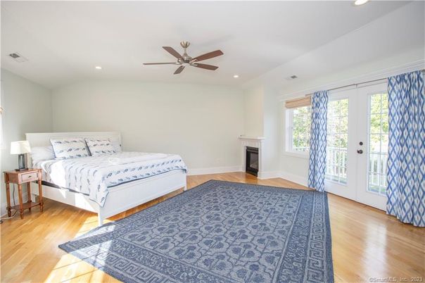 Bedroom, Fireplace, Interior, Recessed Lighting, Wood Texture Flooring