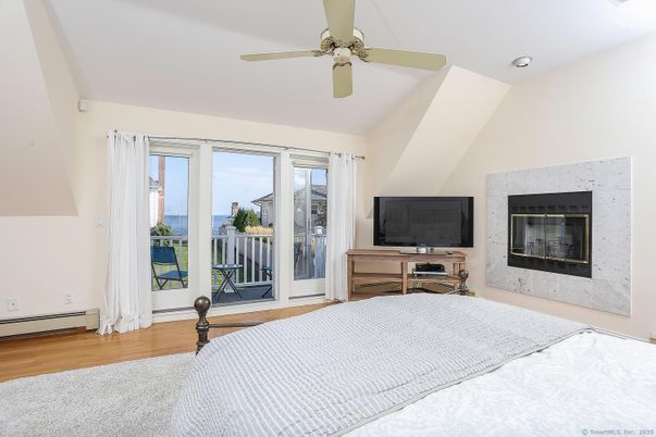 Bedroom, Fireplace, Interior, Water, Wood Texture Flooring
