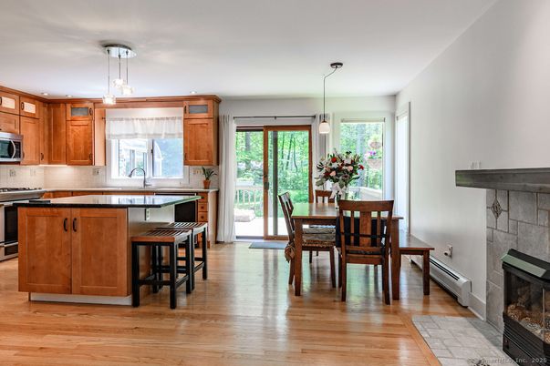 Dining room, Fireplace, Interior, Kitchen, Pendant Lights, Recessed Lighting, Wood Texture Flooring