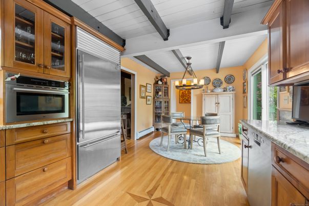 Chandelier, Dining room, Interior, Kitchen, Stainless Steel Appliances, Wooden Beams, Wood Texture Flooring
