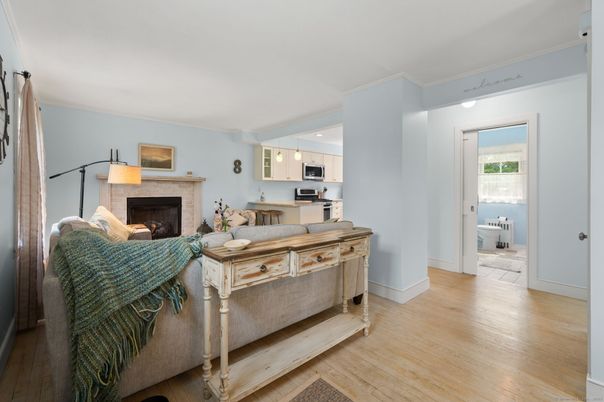 Fireplace, Interior, Kitchen, Pendant Lights, Stainless Steel Appliances, Wood Texture Flooring