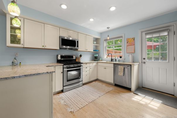 Interior, Kitchen, Pendant Lights, Recessed Lighting, Stainless Steel Appliances, Wood Texture Flooring