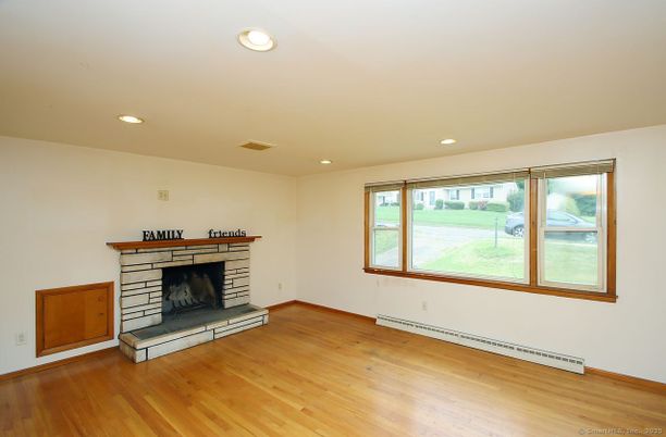 Empty room, Fireplace, Interior, Recessed Lighting, Wood Texture Flooring