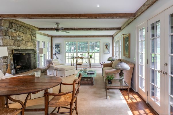 Dining room, Fireplace, Interior, Living room, Recessed Lighting, Stone Walls, Wooden Beams, Wood Texture Flooring