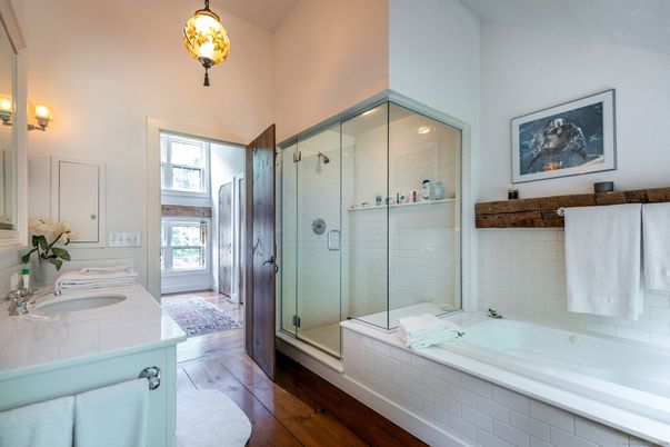 Bathroom, Dual Sink Vanities, Glass Shower, Interior, Pendant Lights, Wood Texture Flooring