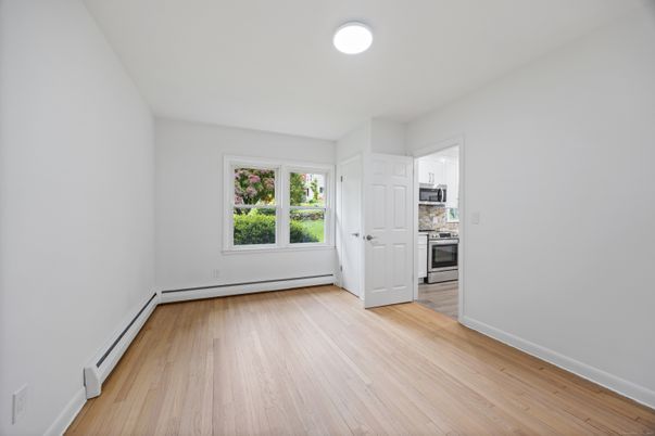 Empty room, Interior, Kitchen, Stainless Steel Appliances, Wood Texture Flooring