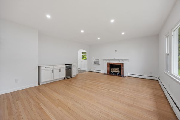 Empty room, Fireplace, Interior, Recessed Lighting, Wood Texture Flooring