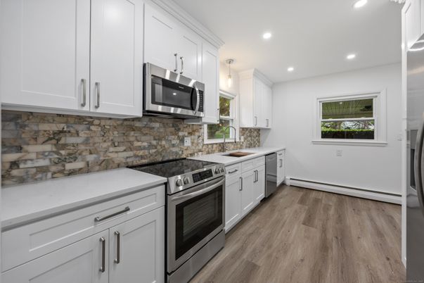 Interior, Kitchen, Pendant Lights, Recessed Lighting, Stainless Steel Appliances, Wood Texture Flooring