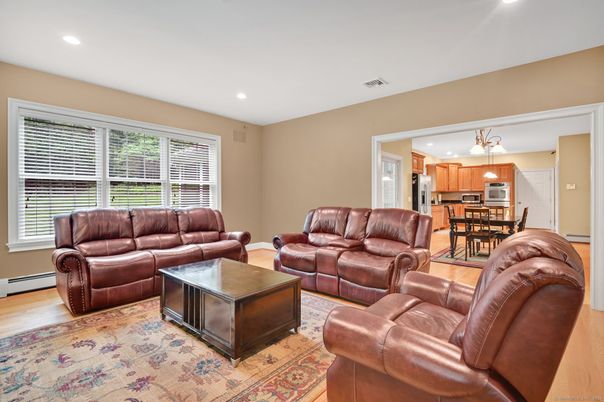 Dining room, Interior, Kitchen, Living room, Recessed Lighting, Stainless Steel Appliances, Wood Texture Flooring