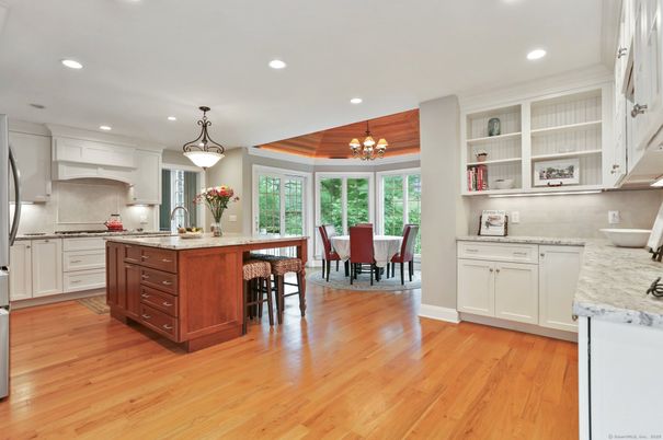 Chandelier, Dining room, Interior, Kitchen, Pendant Lights, Recessed Lighting, Wooden Ceilings, Wood Texture Flooring