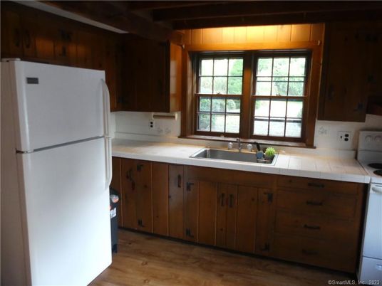 Interior, Kitchen, Tile Countertops, Wood Texture Flooring