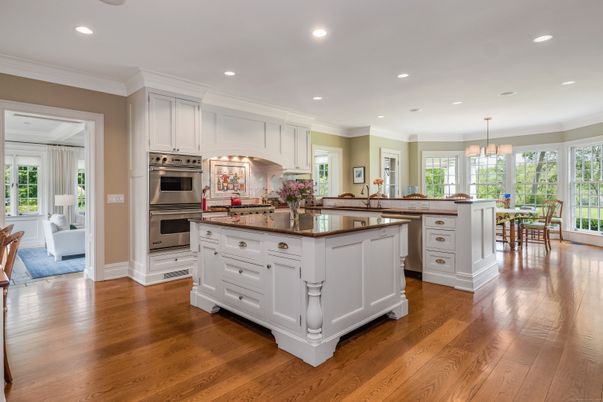 Chandelier, Dining room, Interior, Kitchen, Pendant Lights, Recessed Lighting, Stainless Steel Appliances, Wood Texture Flooring