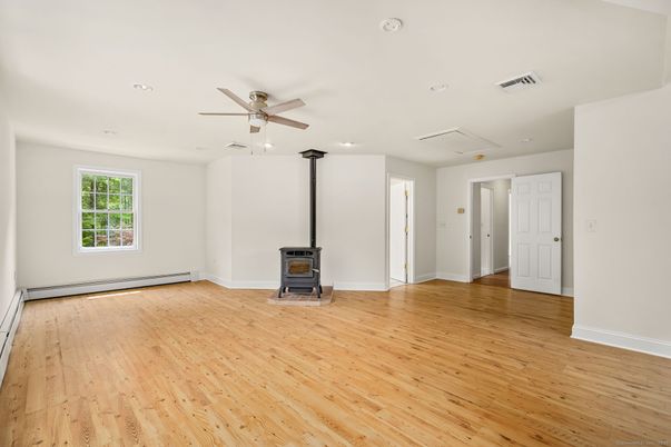 Empty room, Fireplace, Interior, Recessed Lighting, Wood Texture Flooring