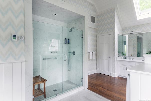 Bathroom, Glass Shower, Interior, Marble Walls, Recessed Lighting, Wood Texture Flooring