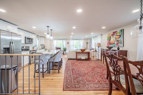 Dining room, Interior, Kitchen, Living room, Pendant Lights, Recessed Lighting, Stainless Steel Appliances, Wood Texture Flooring