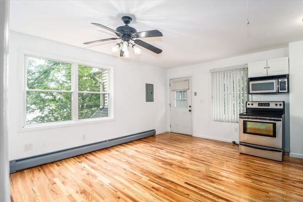 Empty room, Interior, Kitchen, Stainless Steel Appliances, Wood Texture Flooring