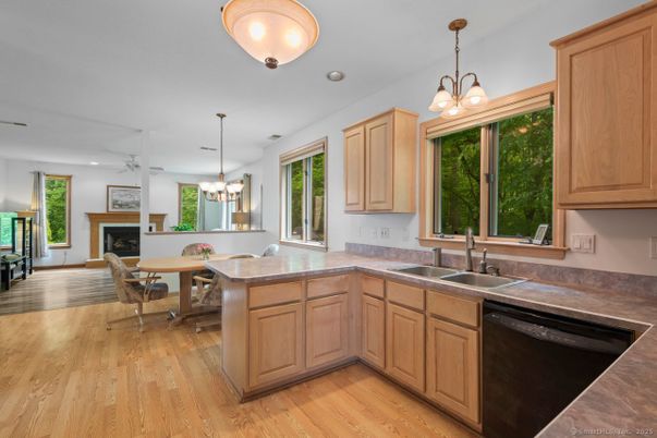 Chandelier, Dining room, Fireplace, Interior, Kitchen, Pendant Lights, Recessed Lighting, Wood Texture Flooring