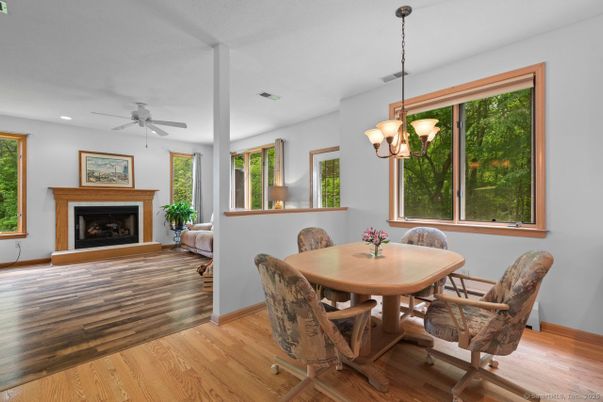 Chandelier, Dining room, Fireplace, Interior, Recessed Lighting, Wood Texture Flooring
