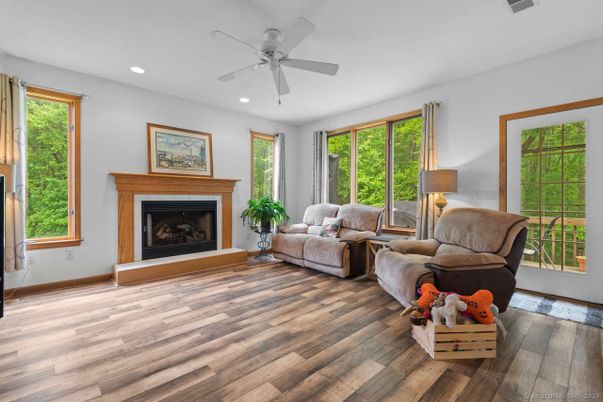 Fireplace, Interior, Living room, Recessed Lighting, Wood Texture Flooring
