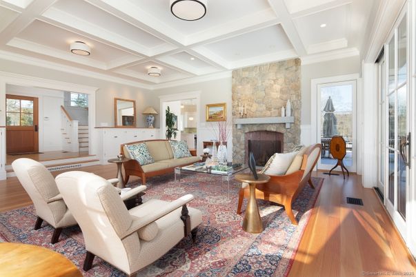 Fireplace, Interior, Living room, Recessed Lighting, Stone Walls, Wood Texture Flooring