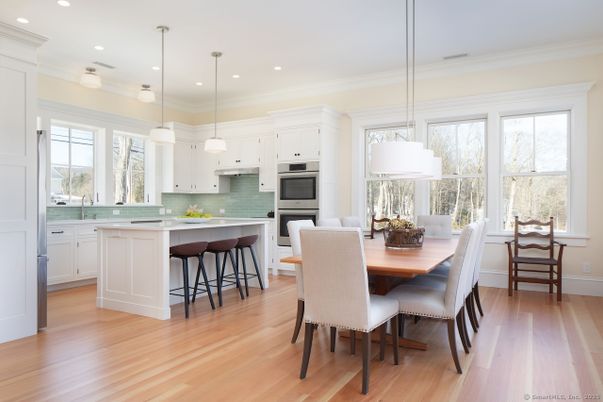 Dining room, Interior, Kitchen, Pendant Lights, Recessed Lighting, Stainless Steel Appliances, Wood Texture Flooring