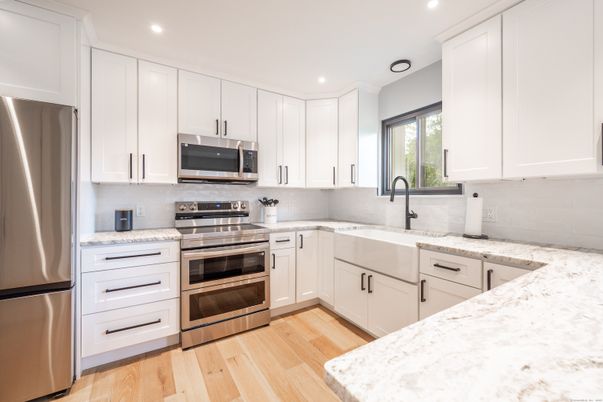 Interior, Kitchen, Recessed Lighting, Stainless Steel Appliances, Wood Texture Flooring