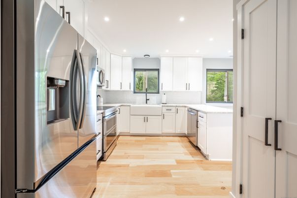Interior, Kitchen, Recessed Lighting, Stainless Steel Appliances, Wood Texture Flooring