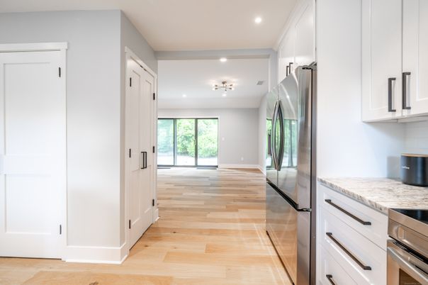 Interior, Kitchen, Recessed Lighting, Stainless Steel Appliances, Wood Texture Flooring
