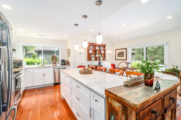 Dining room, Interior, Kitchen, Pendant Lights, Recessed Lighting, Stainless Steel Appliances, Wood Texture Flooring