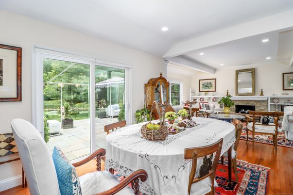 Dining room, Fireplace, Interior, Living room, Recessed Lighting, Wood Texture Flooring