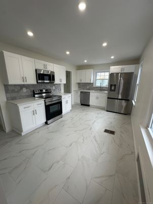 Interior, Kitchen, Marble, Recessed Lighting, Stainless Steel Appliances