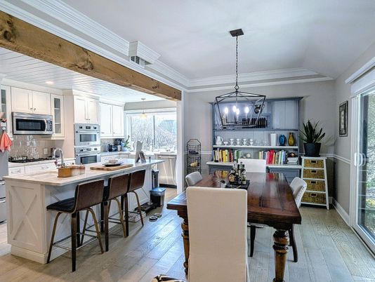 Chandelier, Dining room, Interior, Kitchen, Pendant Lights, Recessed Lighting, Stainless Steel Appliances, Wood Texture Flooring