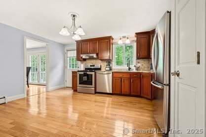 Chandelier, Interior, Kitchen, Pendant Lights, Stainless Steel Appliances, Wood Texture Flooring