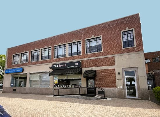 Exterior, Facade, Brick Facade, Condo Building