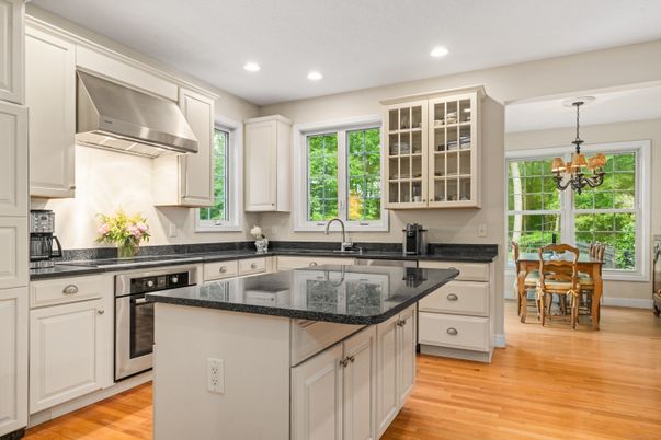 Chandelier, Dining room, Interior, Kitchen, Pendant Lights, Recessed Lighting, Stainless Steel Appliances, Wood Texture Flooring