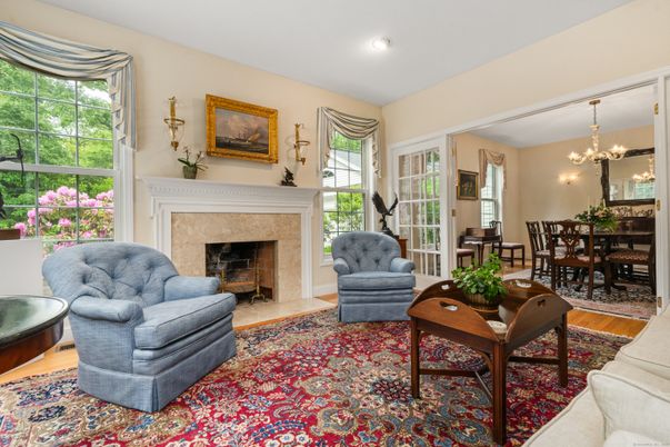 Chandelier, Dining room, Fireplace, Interior, Living room, Recessed Lighting, Wood Texture Flooring