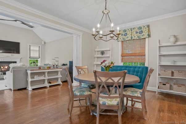 Chandelier, Dining room, Fireplace, Interior, Living room, Pendant Lights, Wood Texture Flooring