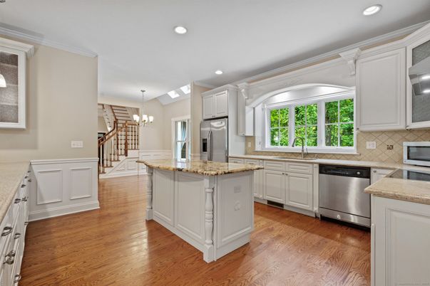 Chandelier, Interior, Kitchen, Recessed Lighting, Stainless Steel Appliances, Wood Texture Flooring