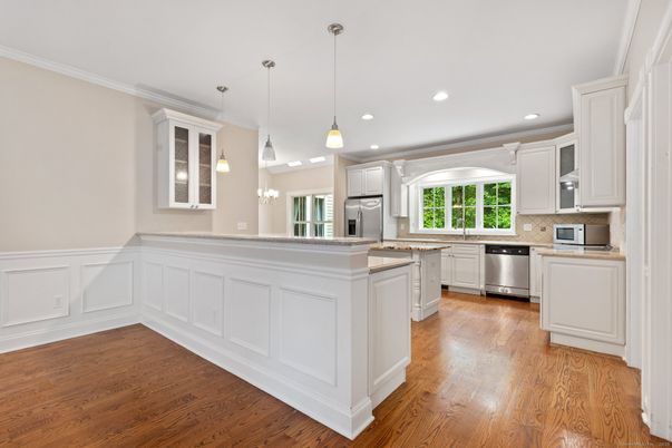 Interior, Kitchen, Pendant Lights, Recessed Lighting, Stainless Steel Appliances, Wood Texture Flooring