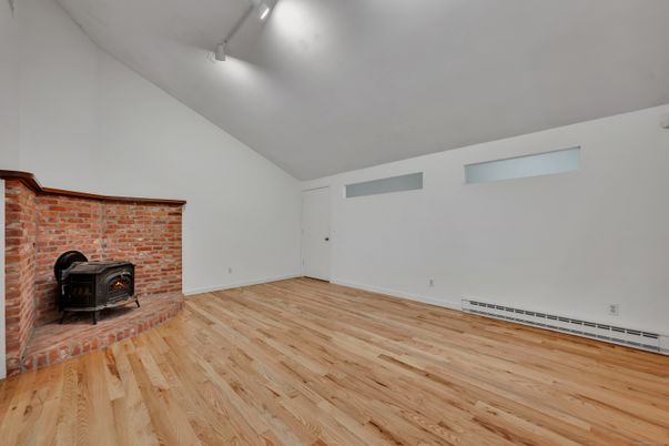 Empty room, Fireplace, Interior, Stone Walls, Wood Texture Flooring