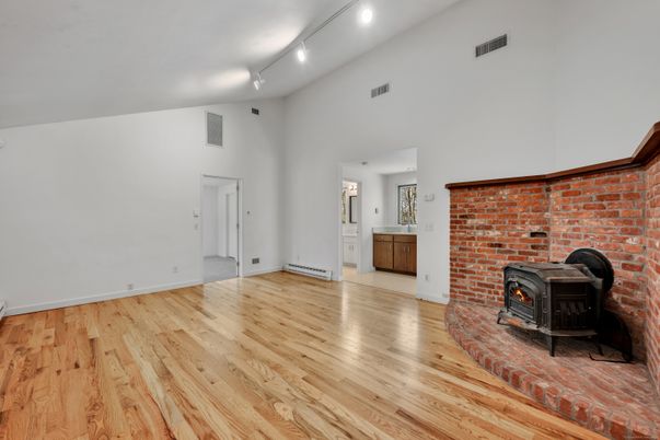 Empty room, Fireplace, Interior, Stone Walls, Wood Texture Flooring