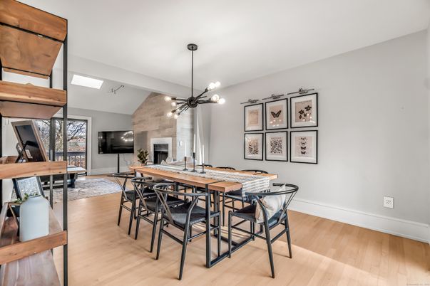 Dining room, Fireplace, Interior, Pendant Lights, Piano, Wood Texture Flooring