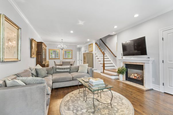 Chandelier, Dining room, Fireplace, Interior, Living room, Recessed Lighting, Wood Texture Flooring