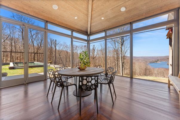 Dining room, Interior, Recessed Lighting, Sun Room, Water, Wooden Ceilings, Wood Texture Flooring
