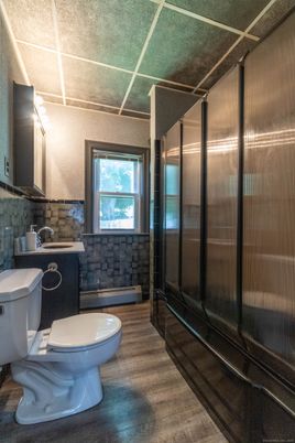 Bathroom, Glass Shower, Interior, Wood Texture Flooring