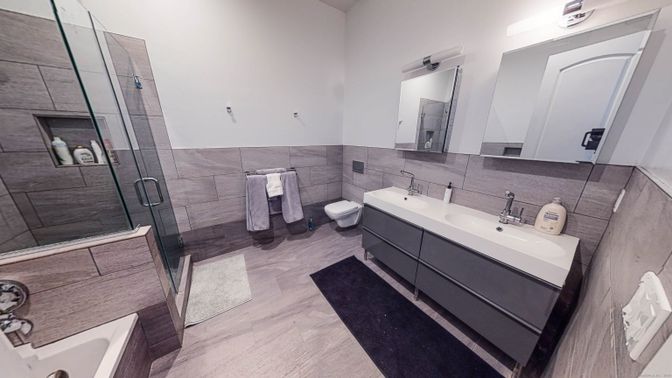 Bathroom, Dual Sink Vanities, Glass Shower, Interior, Wood Texture Flooring